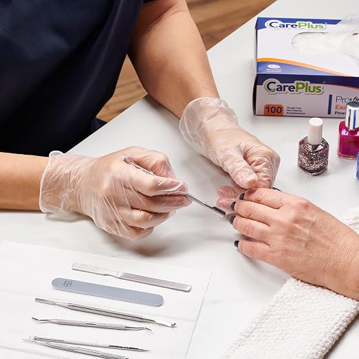 CARE PLUS Vinyl Gloves Clear Medium, Disposable Latex Free, 100 Count | Powder free exam grade protection for food service, salons & housekeeping; ambidextrous, tear resistant, comfortable fit